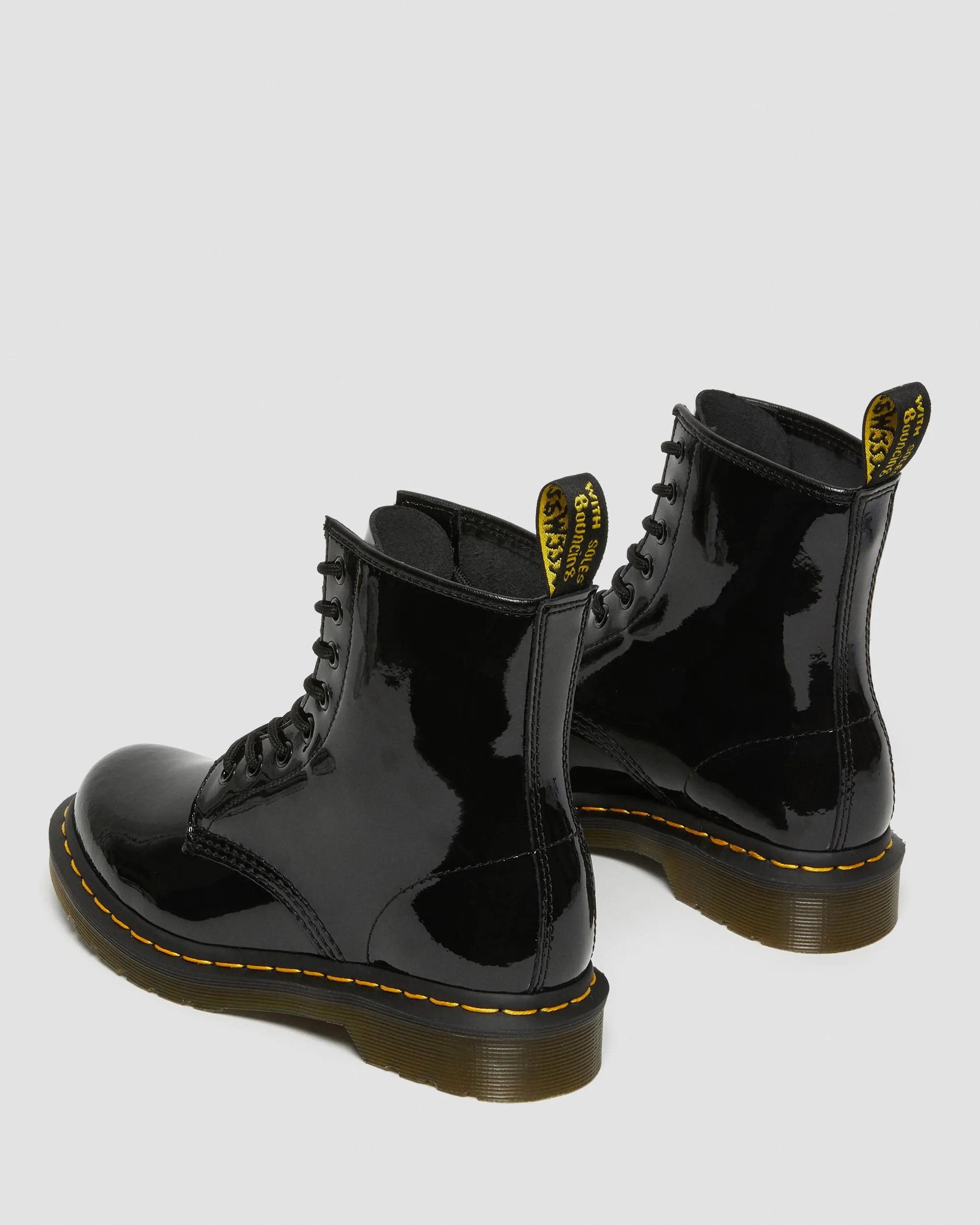 1460 Women's patent leather lace-up boots Dr. Martens
