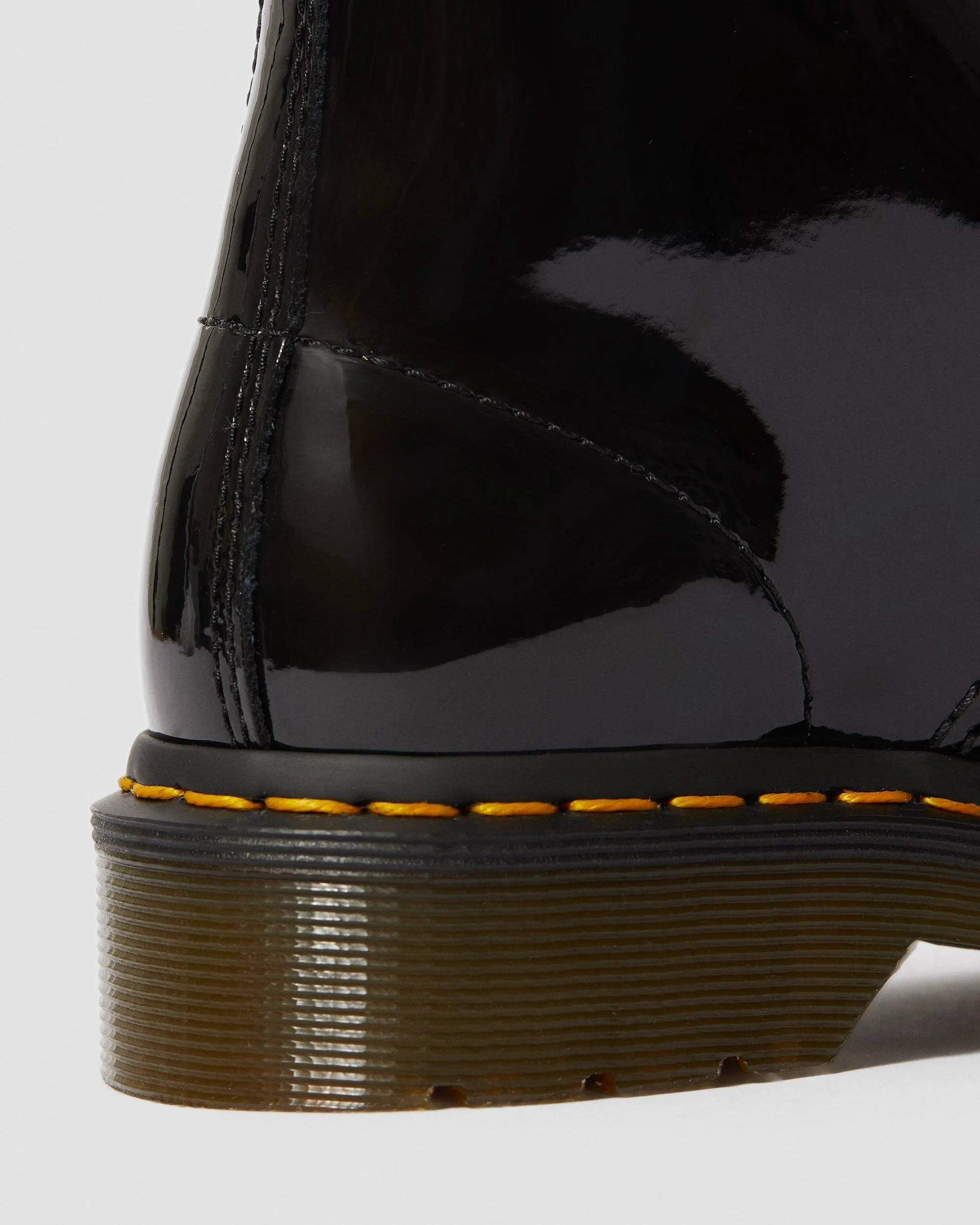 1460 Women's patent leather lace-up boots Dr. Martens